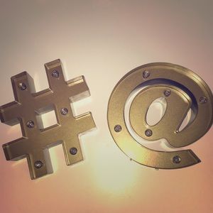 2 gold, light up signs.